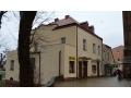 ustny przetarg nieograniczony na sprzedaż nieruchomości Lokal mieszkalny Nr 1A o pow. 20,70 m2 położony w Sławnie przy  ul. M. C. Skłodowskiej 22